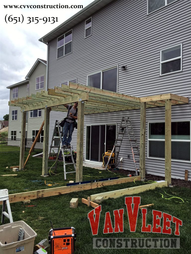 deck over living space construction on Minneapolis Deck Builder Vanvleet Construction Deck Contractor